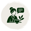 A dark green minimalist icon of a woman in a kimono sitting at a table with a bowl, a speech bubble, and leaves, centered inside a textured off-white circle on a light gray background.